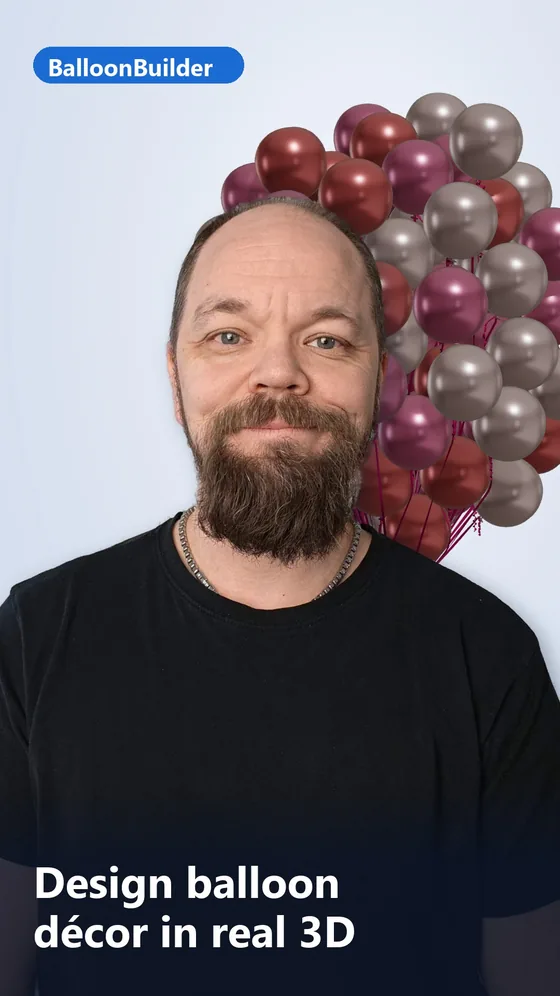 Juho Hokkanen, balloon artist and founder of BalloonBuilder, with a 3D balloon bouquet designed in BalloonBuilder